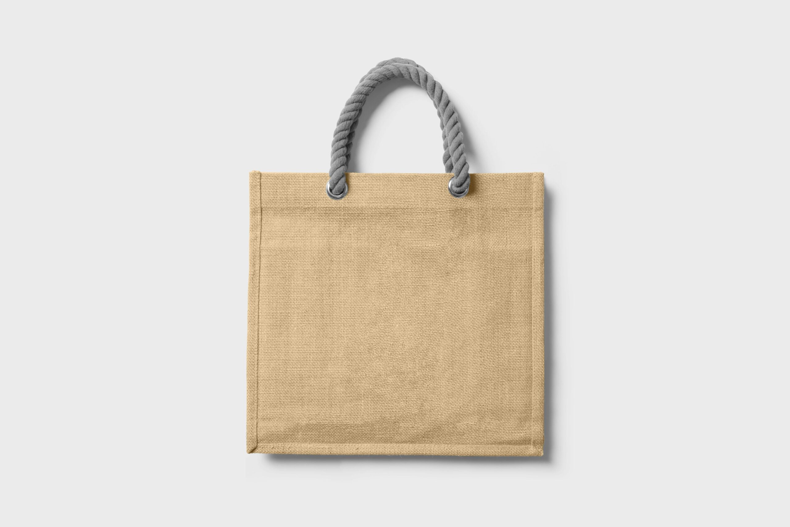 Simple jute tote bag with rope handles on a clean white background, perfect for eco-conscious branding.